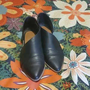 Black faux leather flats